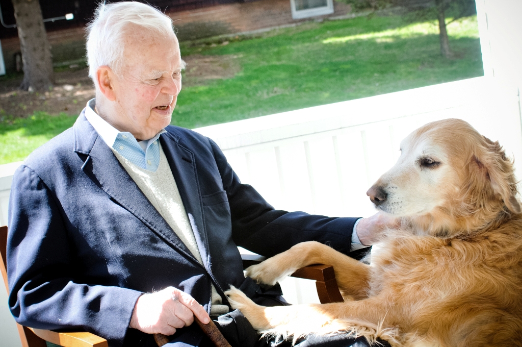 Senator Gannett relaxing with his beloved dog Toby