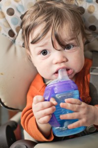 Baby With Sippy Bottle